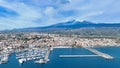 Riposto - vista aerea dall'alto sul porto della cittÃÂ  durante giornata di sole con Etna sullo sfondo